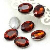 Kaboszon szklany owal fasetowany smoked topaz 18x13mm