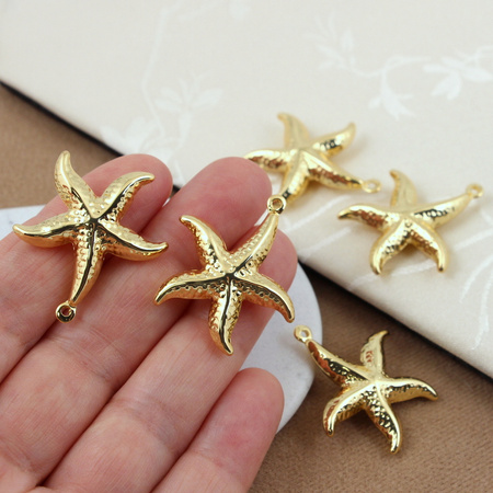 Zawieszka rozgwiazda mosiądz złocony 28mm