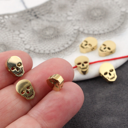 Przekładka czaszka stal szlachetna pozłacana 10x7mm