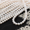 Perła słodkowodna biała kula 5-6mm [sznur 39cm]