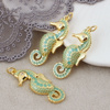 Zawieszka konik morski mosiądz złocony emaliowana zielona 30x11mm