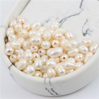 Perła słodkowodna biała z dużym otworem 8x6mm