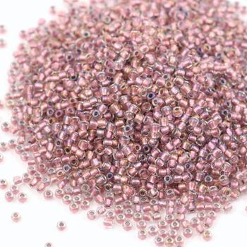 Toho Round 11/0 Inside-Color Crystal/Rose Gold-Lined [10g]