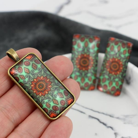 Kaboszon szklany z grafiką ornament pomarańczowy 38x19mm