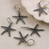 Zawieszka metalowa rozgwiazda srebrna 24x22mm