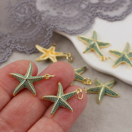 Zawieszka rozgwiazda mosiądz złocony emaliowana turkusowa 18mm