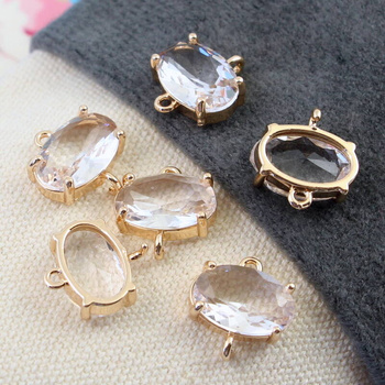 Łącznik owal w złotej oprawie crystal deluxe 12x8mm