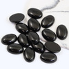 Kaboszon czarny agat owal 18x13mm