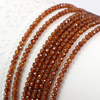 Granat (hessonit) kula fasetowana 4mm [sznur 38cm]