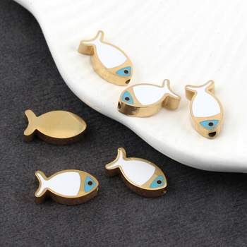 Przekładka emaliowana stal szlachetna ryba pozłacana/biała 14x7mm