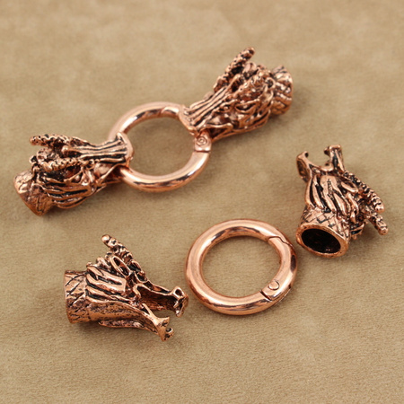 Zapięcie ozdobne kółko uchylne z tulejkami - głowa smoka miedziane