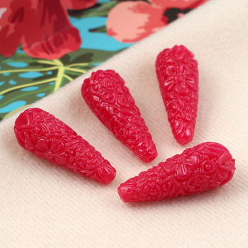 Rzeźbiona kropla różowa 28x11mm