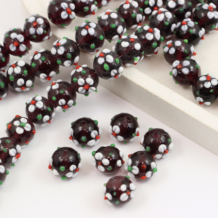 Koralik szklany w kwiatki ciemny fioletowy 13x12mm