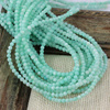 Muszla miętowa kula gładka 3mm [sznur 38cm]