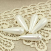 Perła seashell kropla biała 30x8mm