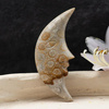 Fossil rzeźbiony księżyc 59x25x12mm