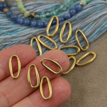 Łącznik nieregularny owal stal szlachetna pozłacana 14x7mm