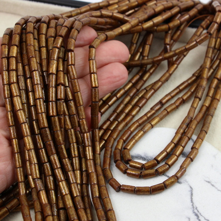 Koral złoty wałek 7x4mm