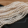 Perła słodkowodna biała kula 6mm [sznur 37cm]