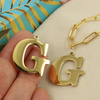 Zawieszka stal szlachetna pozłacana 25mm litera G