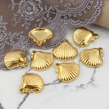 Zawieszka muszla stal szlachetna pozłacana 15mm