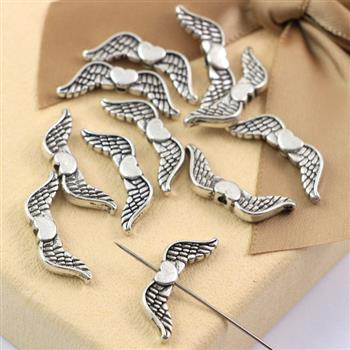 Przekładka metalowe skrzydełka srebrne 20x7mm