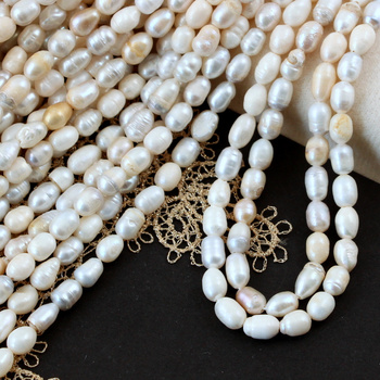 Perła słodkowodna beżowa oliwka 7x5mm [sznur 33cm]