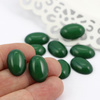 Kaboszon z żywicy owal zielony 18x13mm