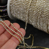 Taśma ozdobna cyrkoniowa gold/crystal 2mm [50cm]