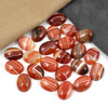 Kaboszon sardonyks brązowy owal 16x12mm [para]