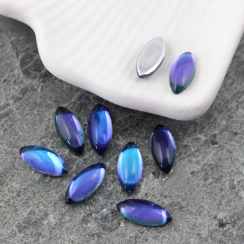 Kaboszon szklany Crystal - Bermuda Blue - Silver Foiled wrzeciono 15x7mm