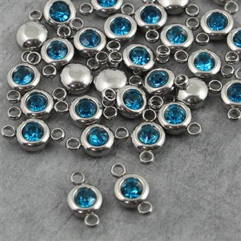 Stal szlachetna łącznik w oprawie SR aquamarine 6mm