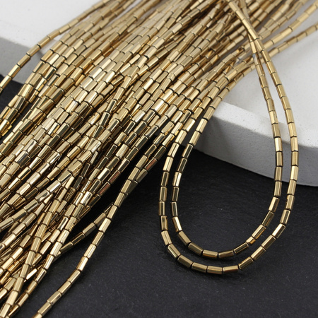 Hematyt złoty wałek fasetowany 4x2mm [sznur 38cm]