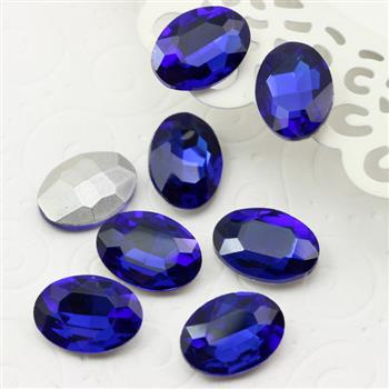 Kaboszon szklany owal fasetowany sapphire 18x13mm