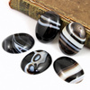 Kaboszon sardonyks owal 40x30mm