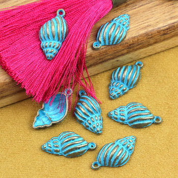 Zawieszka muszla mosiądz patynowany 25x13mm