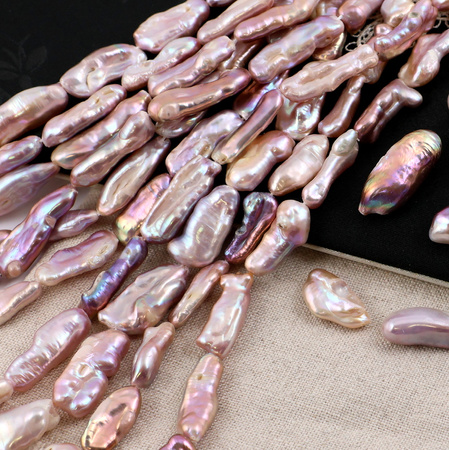 Perła słodkowodna baroque różowa podłużna 20-35mm