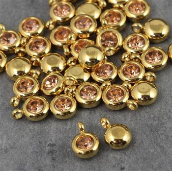 Stal szlachetna zawieszka w oprawie ZŁ light peach 6mm