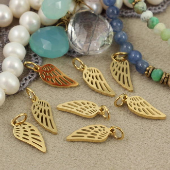 Zawieszka stal szlachetna pozłacana ażurowe skrzydło 15x6mm