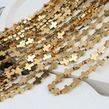 Hematyt złoty krzyżyk 8x6mm [sznur 39cm]