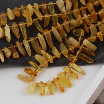 Bursztyn groty 14mm [sznur 38cm]