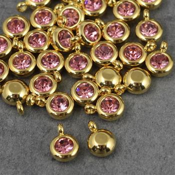 Stal szlachetna zawieszka w oprawie ZŁ light rose 6mm