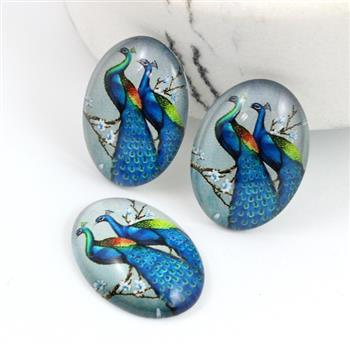 Kaboszon szklany z grafiką paw owal 25x18mm