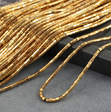 Hematyt złoty mini wałek fasetowany 2x2mm [sznur 39cm]