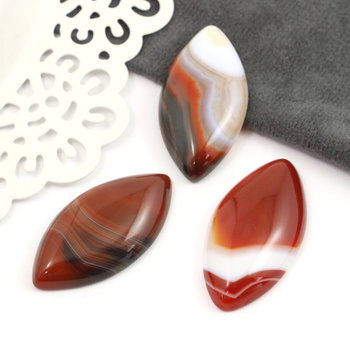 Kaboszon agat pasiasty wrzeciono żółto-brązowe 40x20mm