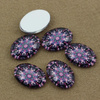 Kaboszon szklany z grafiką owal 18x13mm