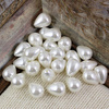 Perła seashell kropla biała 14x10mm
