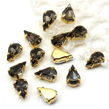 Kaboszon w oprawie łezka fasetowana szara 13x8mm