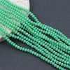 Kryształek szklany oponka fasetowana miętowa 4x3mm [sznur 42cm]