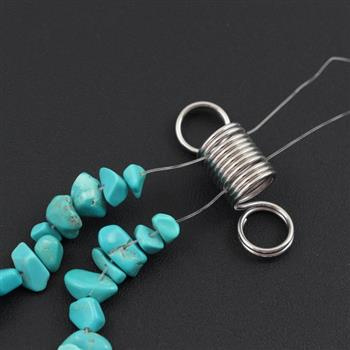 Stoper do zabezpieczania nawleczonych koralików